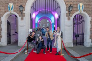 Faux paparazzi photographers, lined up to capture guest arrivals at The Kay Mason Foundation's charity fundrasing Hummingbird Ball at Goodenough College, London.