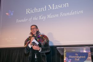 Founder of The Kay Mason Foundation welcoming guests to The Hummingbird Ball, a fundraising charity event at Goodenough House, London