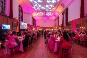 Charity Event Photography of The Great Hall, with guests at The Kay Mason Foundation Hummingbird Ball at Goodenough House, Kings Cross, London.